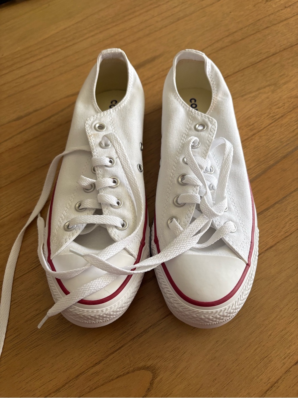 Women Size 9.5 White Converse Canvas Low-Top Sneakers with Red Trim. Brand new